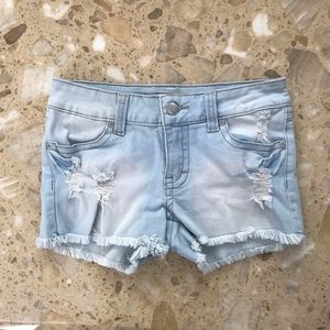 Distressed Blue Jeans